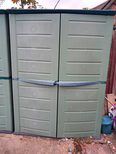 Green plastic storage shed - storage,